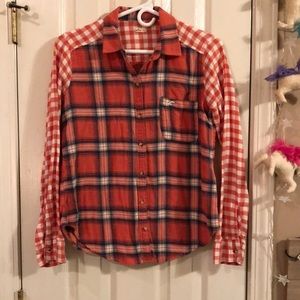 Flannel button up shirt.